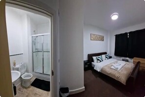 Apartment | Bathroom | Separate tub and shower, deep soaking tub, towels, toilet paper