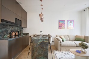 Deluxe Apartment, Balcony, City View (Suite Rubis) | Living area | Flat-screen TV - Le XV Cannes (Cannes)