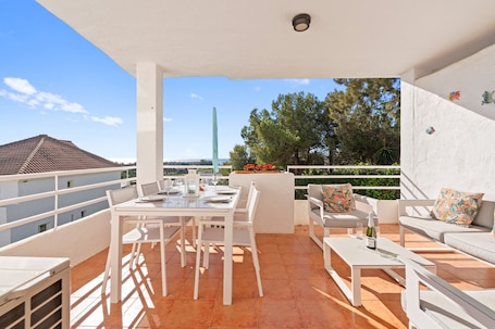 Outdoor dining. Apartment 'Sea View Close To The Beach' with Private Pool, Wi-Fi and Air Conditioning