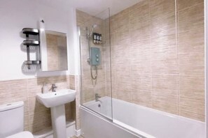 Shower, hair dryer, bidet, towels
