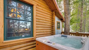 A log cabin with a hot tub and a wooden deck. - ~ 13 Mi to Main St: Park City Cabin w/ Mtn Views! (Park City)