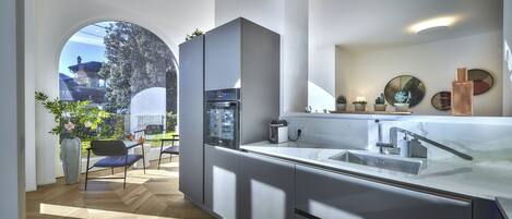 Fridge, dishwasher, cookware/dishes/utensils