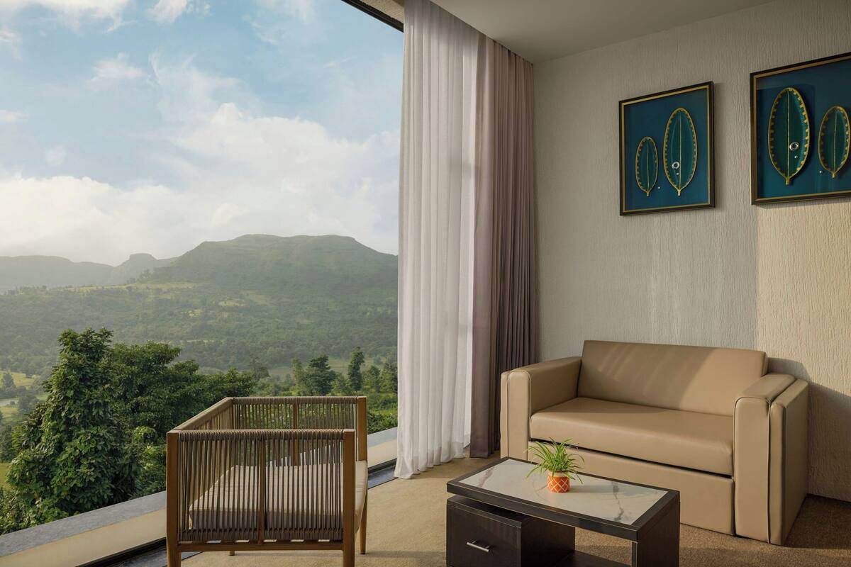 Suite, 1 King-Bett, Bergblick | Wohnzimmer