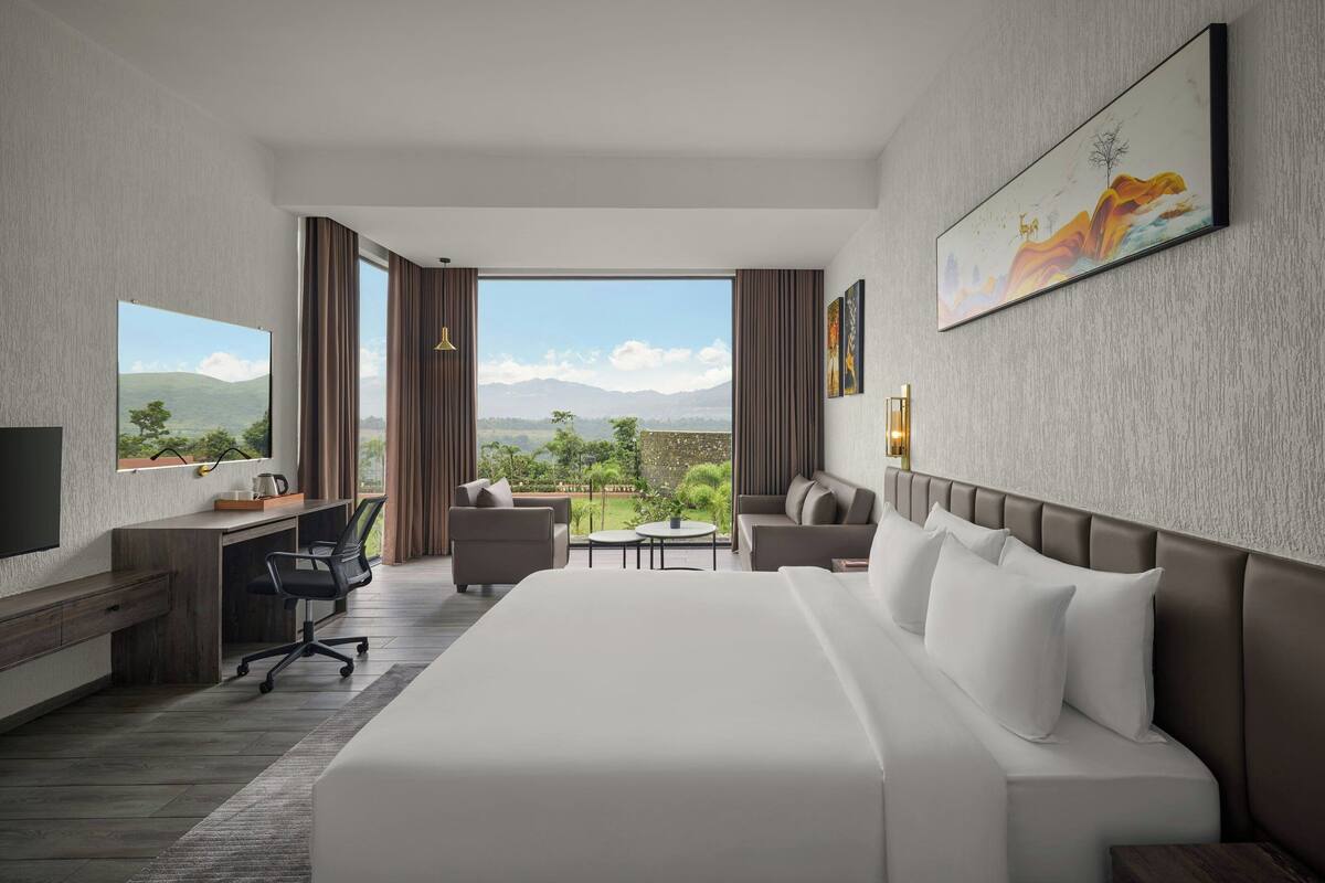 Habitación, 1 cama King size, vista al jardín | 1 habitación, caja de seguridad en la habitación y wifi gratis