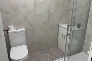 Shower, free toiletries, hair dryer, towels