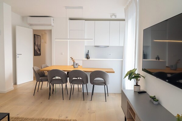 Apartment, Balcony | Living area | 50-inch LCD TV with satellite channels, Netflix, streaming services