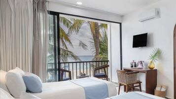 Suite de lujo, 2 camas matrimoniales, baño privado, vista al mar | Ropa de cama de alta calidad y edredón