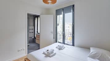 Apartment | Laptop workspace, iron/ironing board, bed sheets