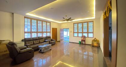 Charming 3-bedroom farmhouse in delightful Hyderabad with AC, Wi-Fi and pool.