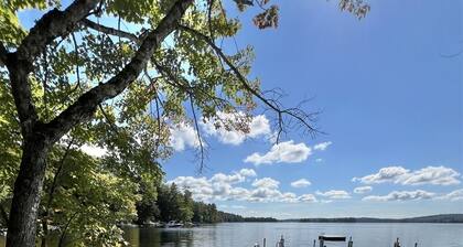SLEEPS 15 WITH A PRIVATE SANDY BEACH ON LONG LAKE.