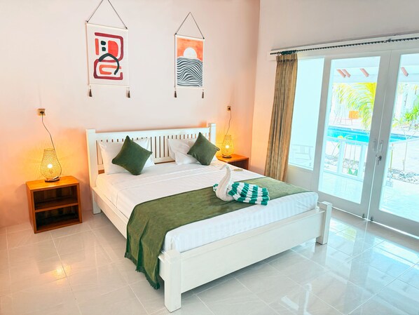 Habitación doble clásica, vista a la alberca | Espacio para trabajar con laptop y wifi gratis 