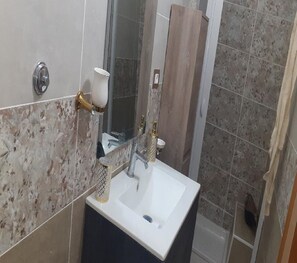 Hair dryer, bidet, towels, soap