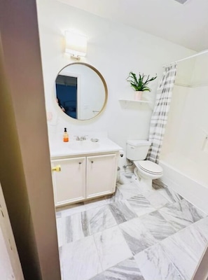 Hair dryer, towels, soap, toilet paper