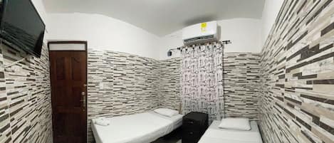 Quarto duplo | Ferros/tábuas de passar roupa, Wi-Fi de cortesia
