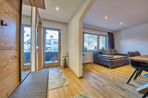 Classic Apartment, 2 Bedrooms, Non Smoking, Balcony | Living area | 55-inch flat-screen TV with cable channels