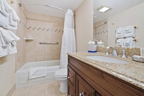 Hair dryer, towels, soap, toilet paper
