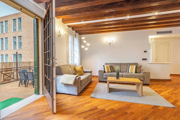 Apartment, Lagoon View | Living area | 35-inch TV with digital channels