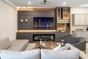 Smart TV, fireplace, video games, foosball