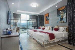 Suite, City View | In-room safe, desk, laptop workspace, iron/ironing board