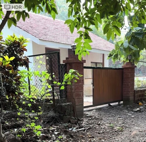 Tranquil 2-bedroom villa in Kashid with AC, WiFi. Enjoy a peaceful getaway