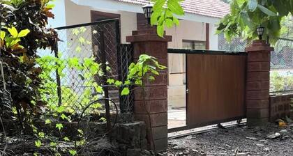 Tranquil 2-bedroom villa in Kashid with AC, WiFi. Enjoy a peaceful getaway