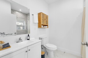 Hair dryer, towels, soap, shampoo