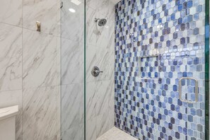 Shower, towels, soap, shampoo
