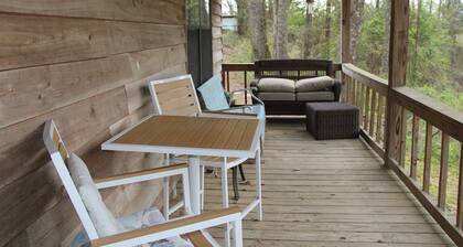 Private cabin on 5 acres near Troy, Alabama with pond.