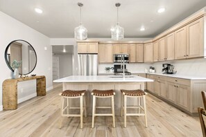 Fridge, microwave, oven, stovetop - Luxe 3 Bedroom Retreat with Balcony and Views (Daniel)