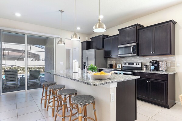 Fridge, microwave, oven, stovetop - 5BD Home in Windsor - Private Pool & Disney Nearby (Davenport)