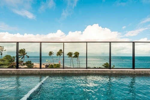 On the sand with private heated pool