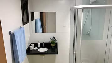 Comfort Apartment | Bathroom | Shower, towels, toilet paper