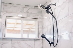 Shower, towels, soap, toilet paper