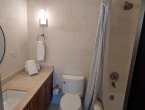 Jetted tub, hair dryer, towels, soap