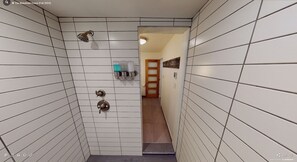 Separate tub and shower, hair dryer, towels, soap - The Wakefield Grand (Wakefield)