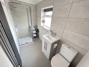 Shower, hair dryer, shampoo