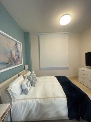 2 dormitorios, tabla de planchar con plancha, cuna de viaje y wifi