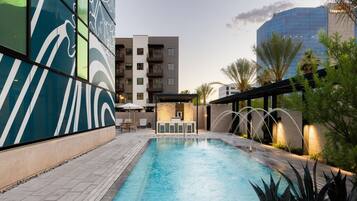 Outdoor pool, pool umbrellas, pool loungers