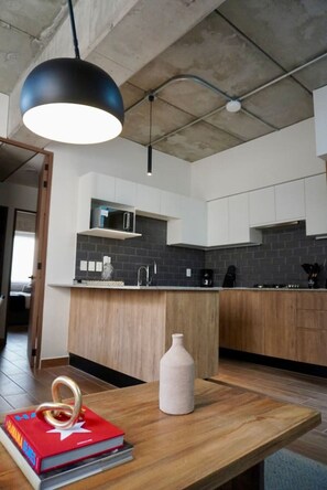 Fridge, microwave, stovetop, cookware/dishes/utensils