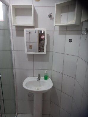 Shower, towels, soap, toilet paper