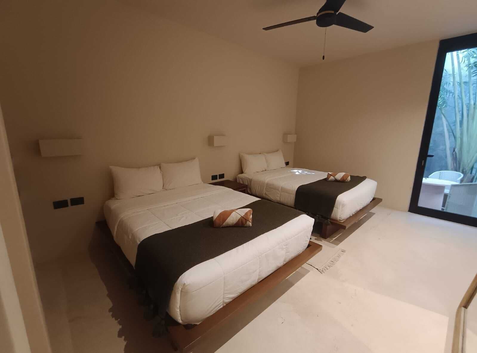 Comfort Quadruple Room | Premium bedding, down comforters, in-room safe, free WiFi