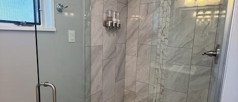 Shower, hair dryer, towels, soap
