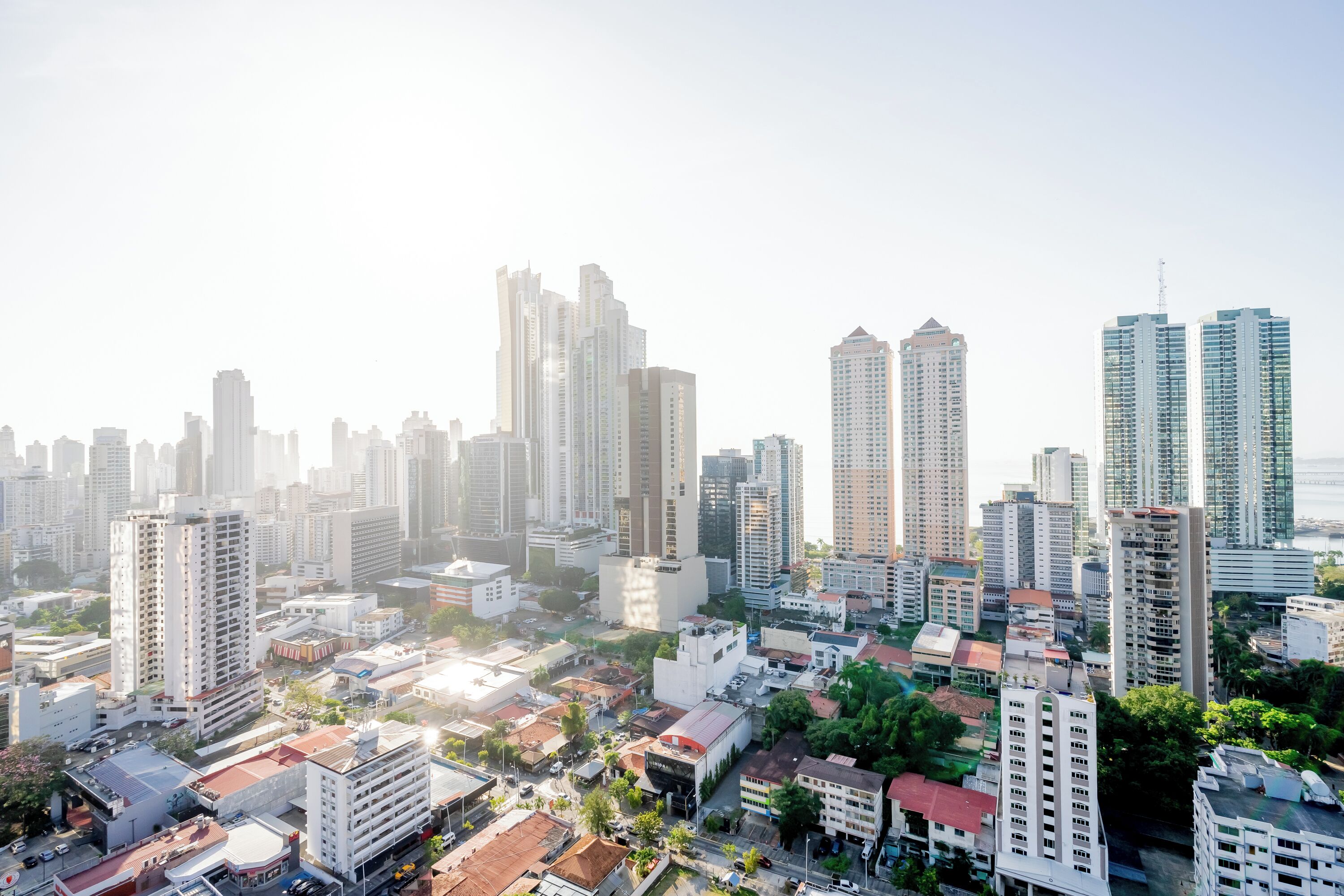 A cityscape with high-rise buildings, streets, and a mix of commercial and residential structures.