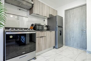 Lejlighed | Privat køkken | Køleskab, mikrobølgeovn, brødrister, blender