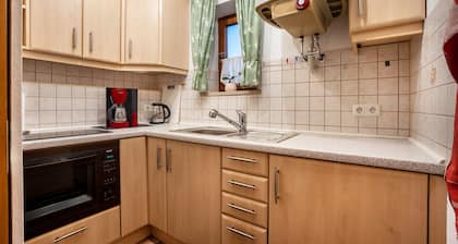 Ferienwohnung 'In Urspring Am Lechstausee' mit Bergblick, Gemeinschaftsgarten und Balkon