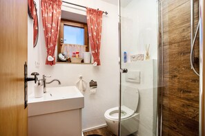 Dutxa, assecador de cabells i tovalloles 