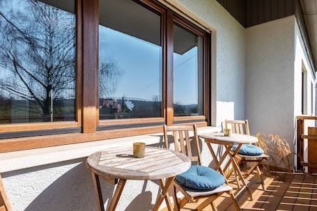 Outdoor dining. Room 'Familienzimmer' with Shared Terrace, Shared Garden and Wi-Fi