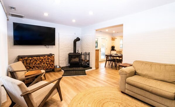 TV, fireplace, books, offices