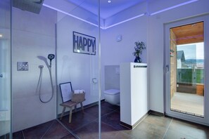 Shower, free toiletries, hair dryer, bathrobes