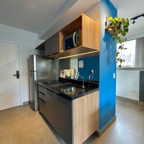 Appartement | Cuisine privée | Réfrigérateur, micro-ondes, plaque de cuisson